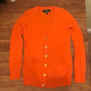 C. Wonder cardigan with gold buttons.